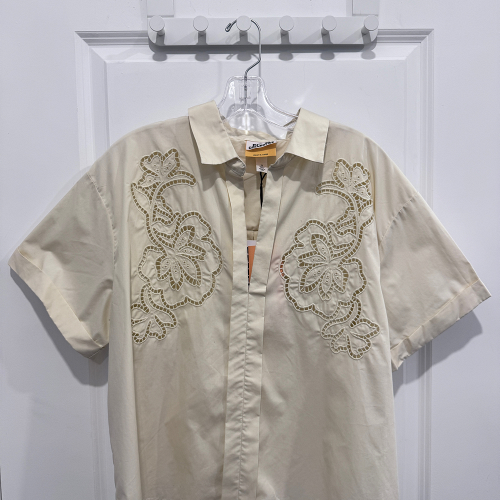 FUTURE COLLECTIVE WOMEN’S EYELET SHORT SLEEVE TOP